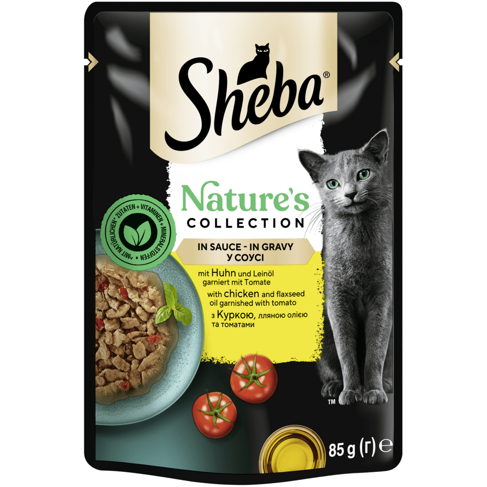 SHEBA® Nature's Collection Huhn & Leinöl garniert mit Tomate in Sauce, 85g - 1